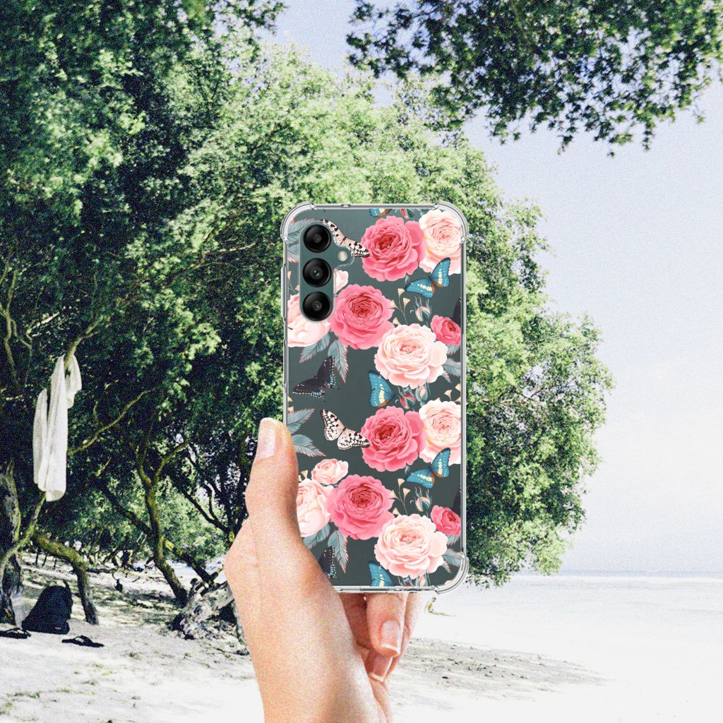 Samsung Galaxy A14 5G/4G Case Butterfly Roses held in hand against beach background with trees.