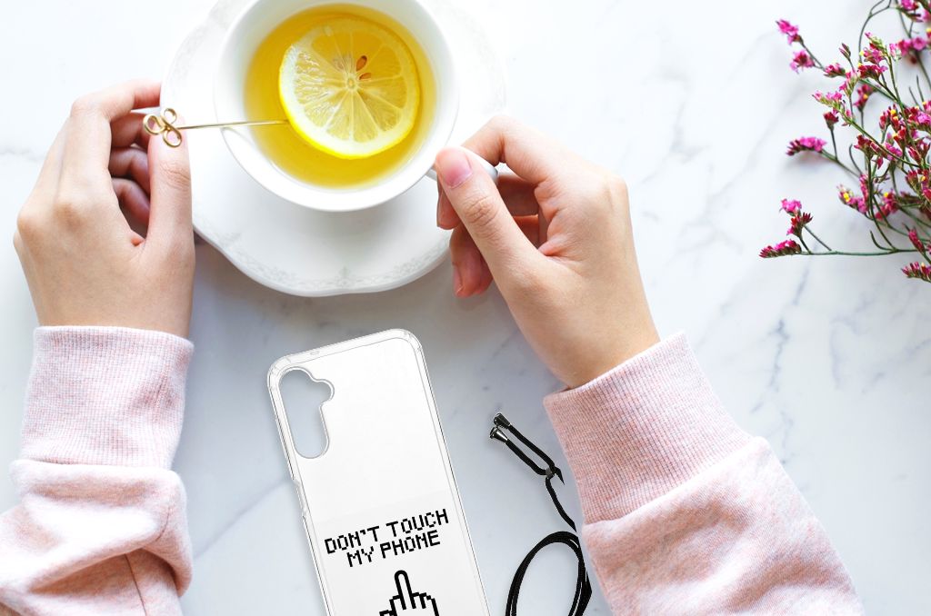 Samsung Galaxy A14 5G Anti Shock Case Finger Don't Touch My Phone displayed with a cup of lemon tea.