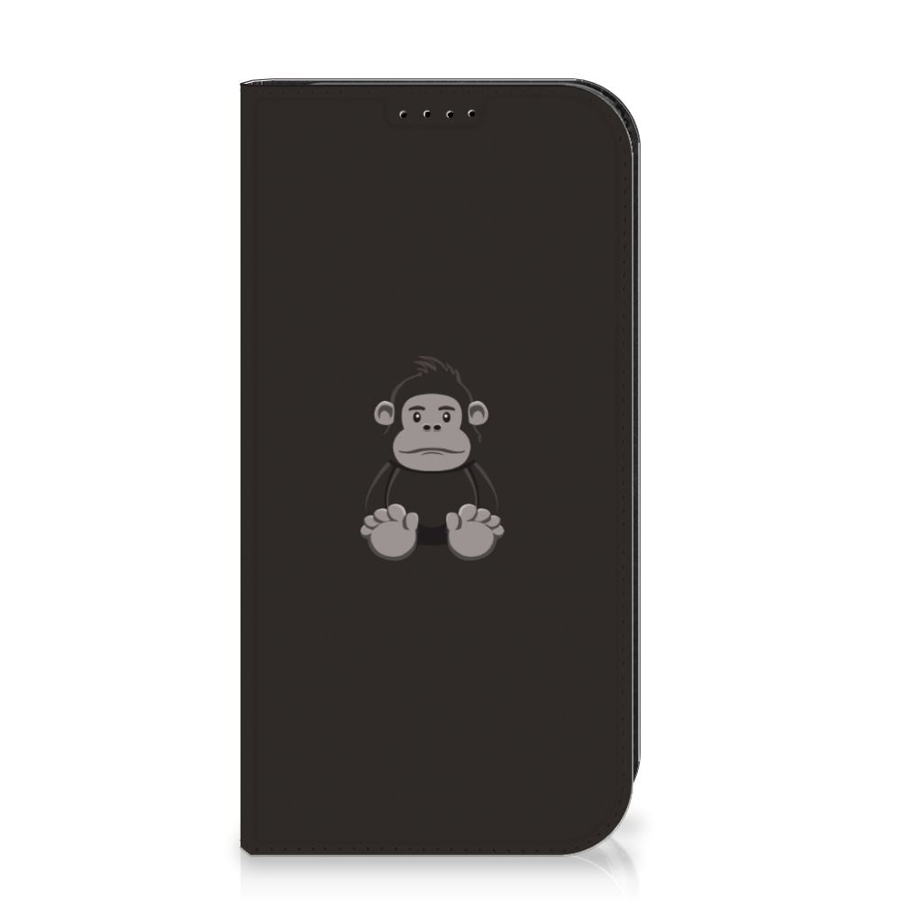 iPhone 15 Pro Magnet Case Gorilla met schattig aapjesontwerp đĻ op een zwarte achtergrond.