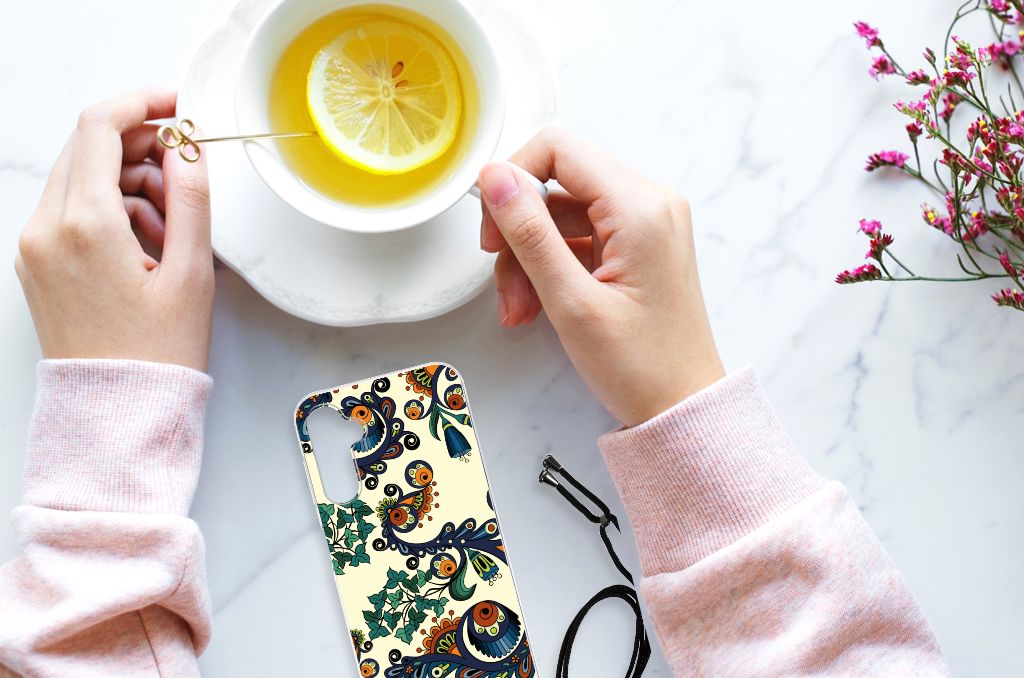 Anti Shock Case Samsung Galaxy A14 5G Barok Flower next to a cup of tea with lemon on a marble surface.