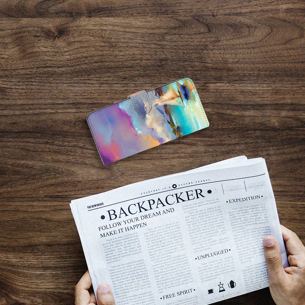 Hoesje Samsung Galaxy A14 4G Boat op een houten tafel met een krant ernaast.