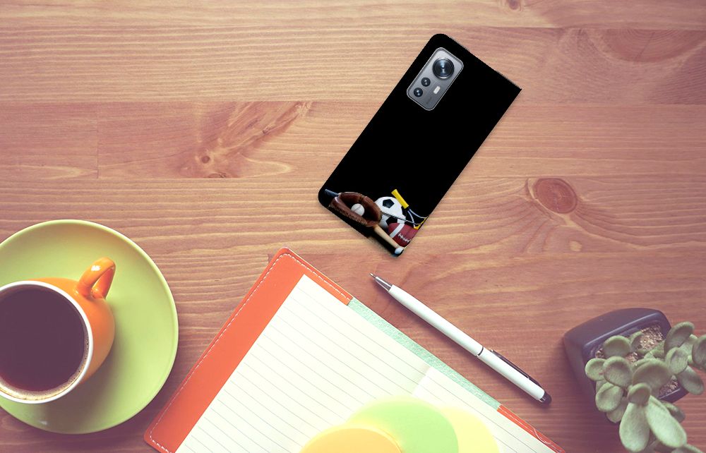 Xiaomi 12 | 12X Hippe Standcase Sports on a desk with a coffee cup and a notebook.