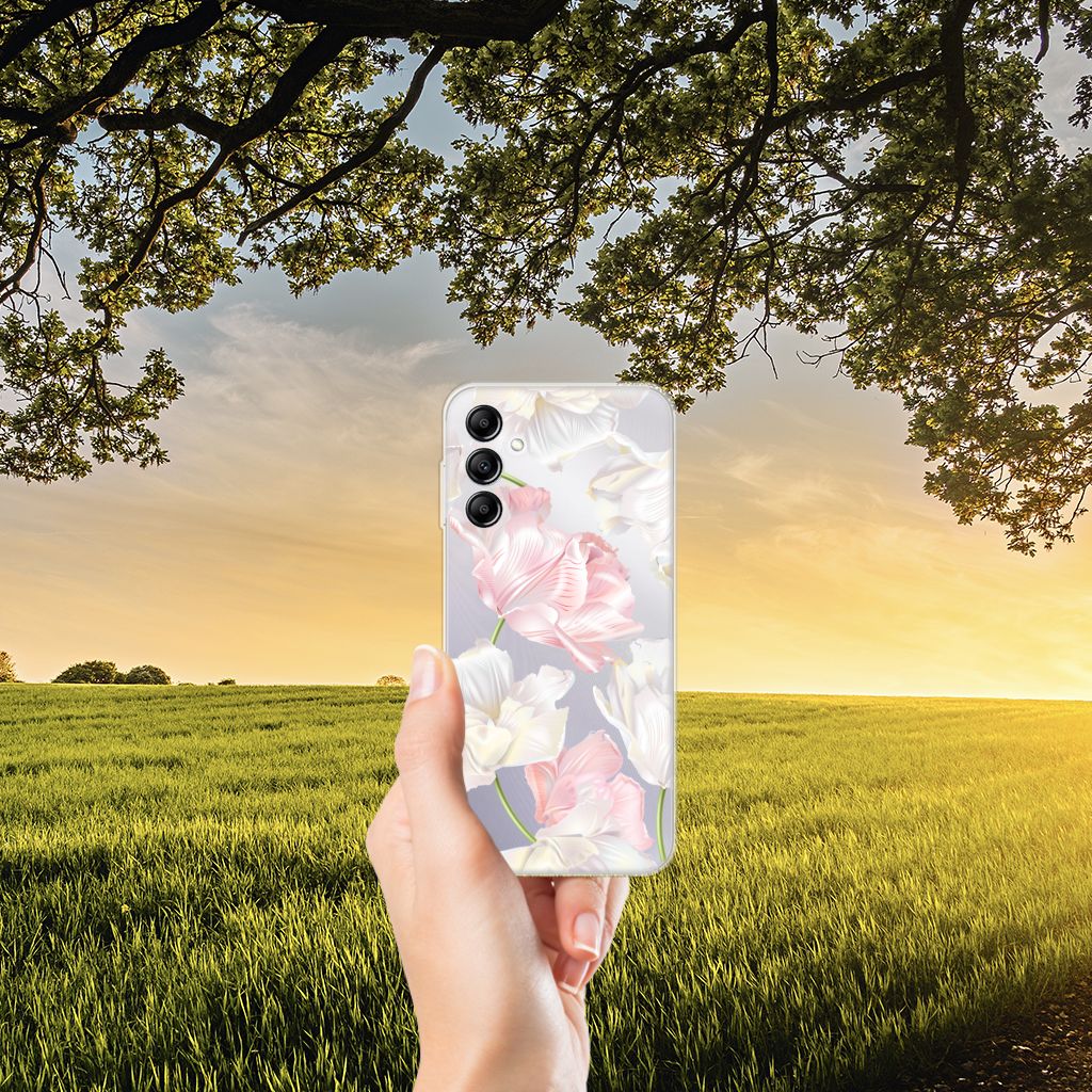 Samsung Galaxy A14 5G TPU Case Lovely Flowers held in hand against a sunset background with greenery.