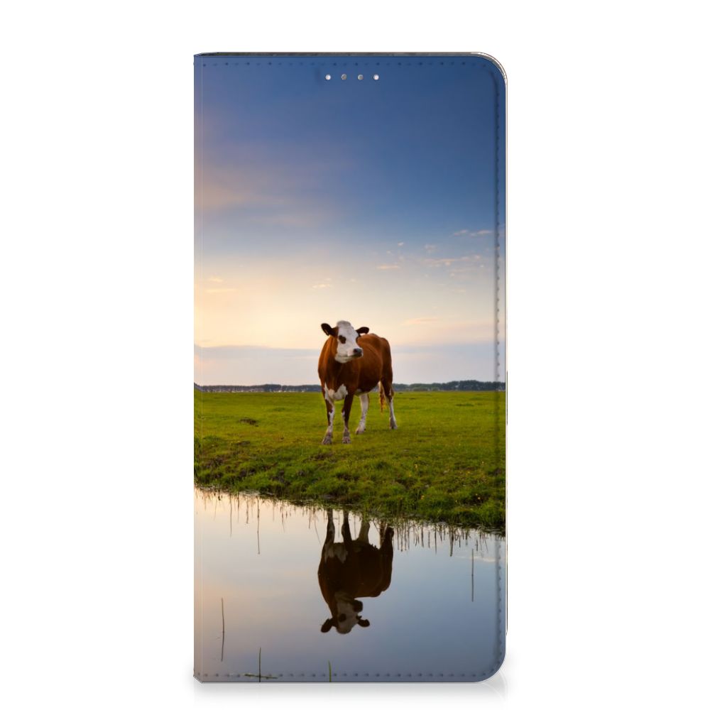 Samsung Galaxy A14 5G Hoesje maken Koe met een afbeelding van een koe en ondergang op de achtergrond.