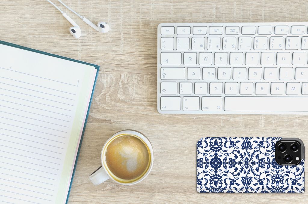 iPhone 13 Pro Max Smart Cover Flower Blue displayed on a desk with coffee and notebook.