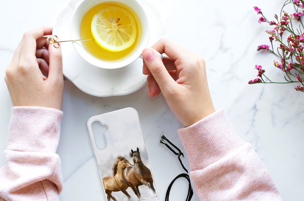 Samsung Galaxy A14 5G Case Anti-shock Paarden displayed with tea and flowers on a marble surface.