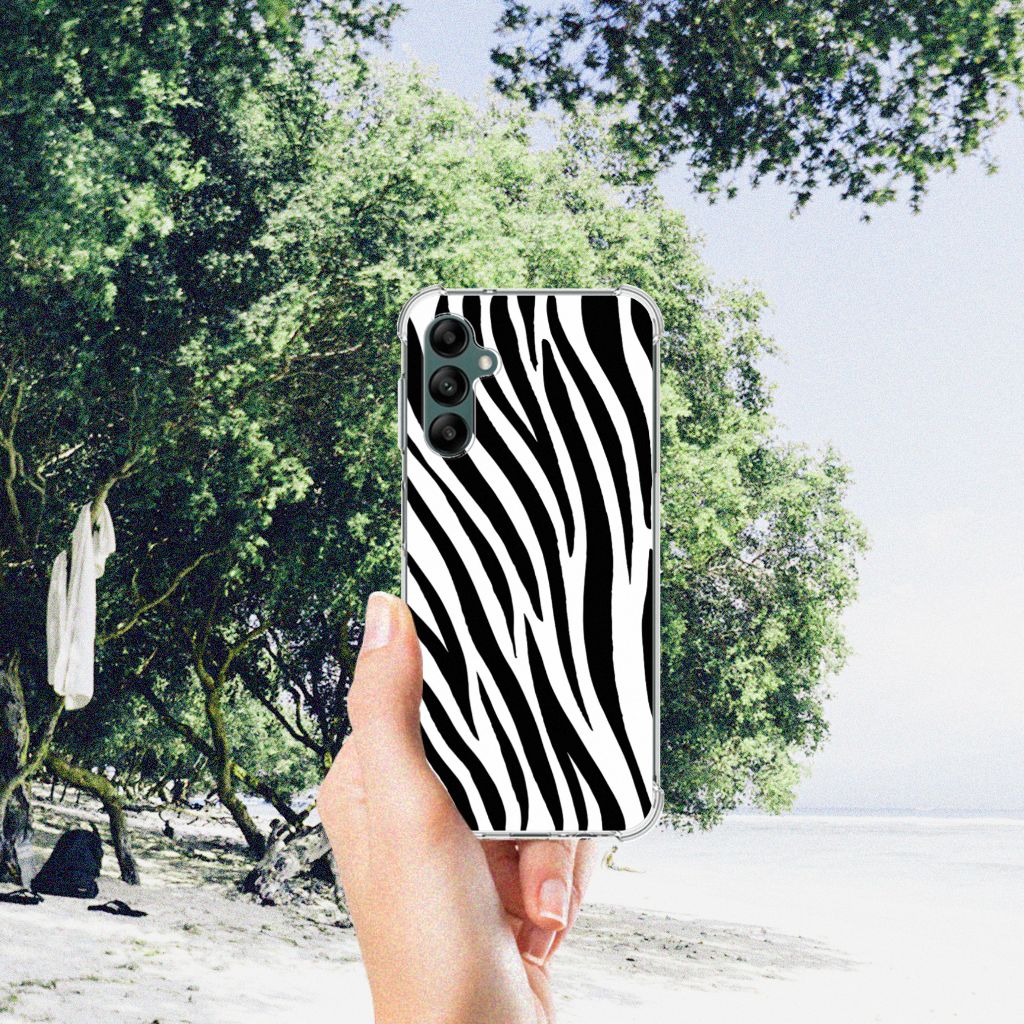Samsung Galaxy A14 5G/4G Case Anti-shock Zebra held outdoors with trees in the background.