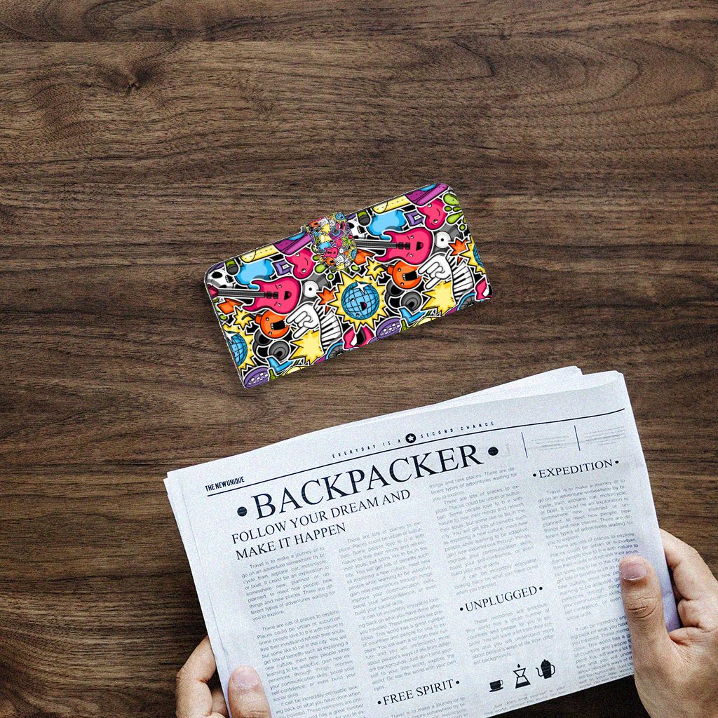 Samsung Galaxy A14 4G Wallet Case met Pasjes Punk Rock op een houten tafel met een krant ernaast.