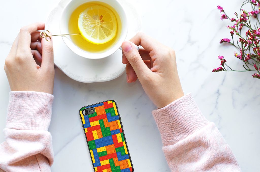 iPhone SE 2022 | SE 2020 | 7/8 Back Case Blokken with colorful design beside a cup of tea on marble table.