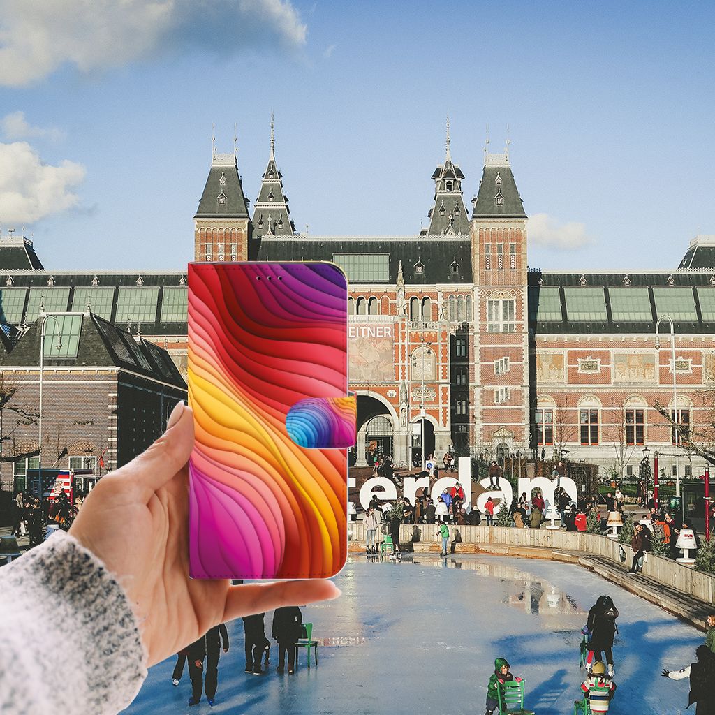 Book Case voor Apple iPhone 11 Pro Max Regenboog in hand voor het Rijksmuseum in Amsterdam