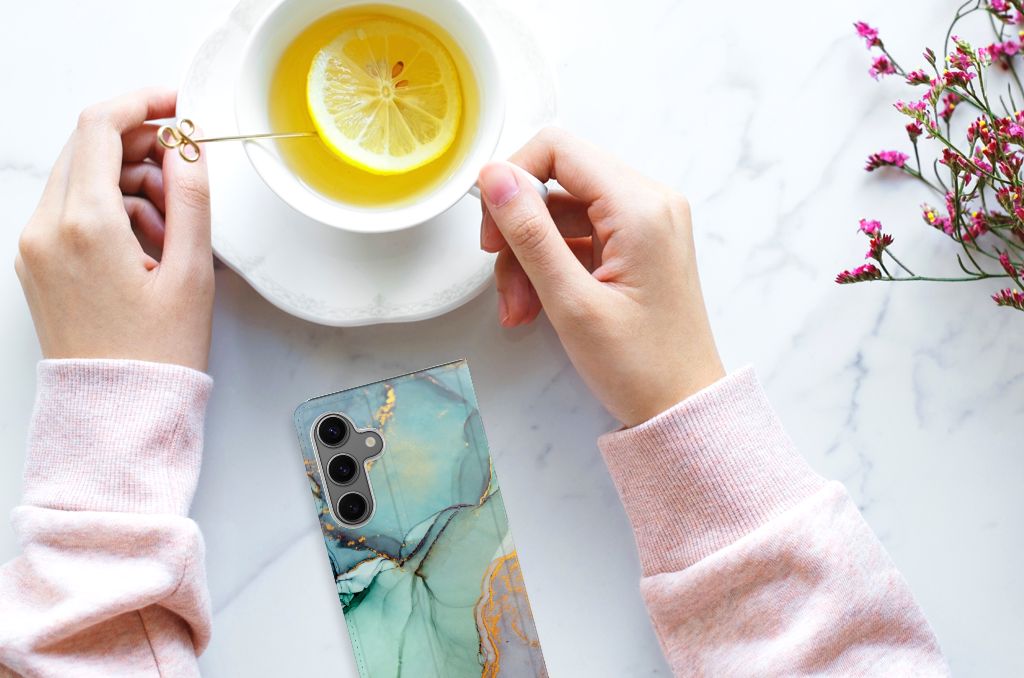 Samsung Galaxy S24 Bookcase Watercolor Mix overhead view hand holding cup