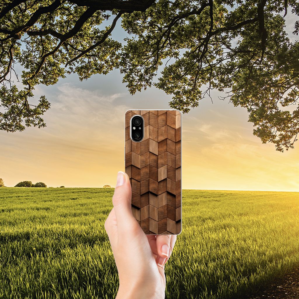 Sony Xperia 5 V Bumper Hoesje voor Sony Xperia 5 V Wooden Cubes hand met hoesje landschap