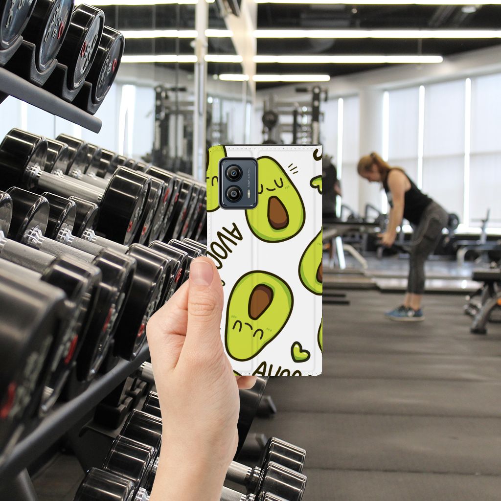 Motorola Moto G53 Magnet Case Avocado Singing hand holding design in gym