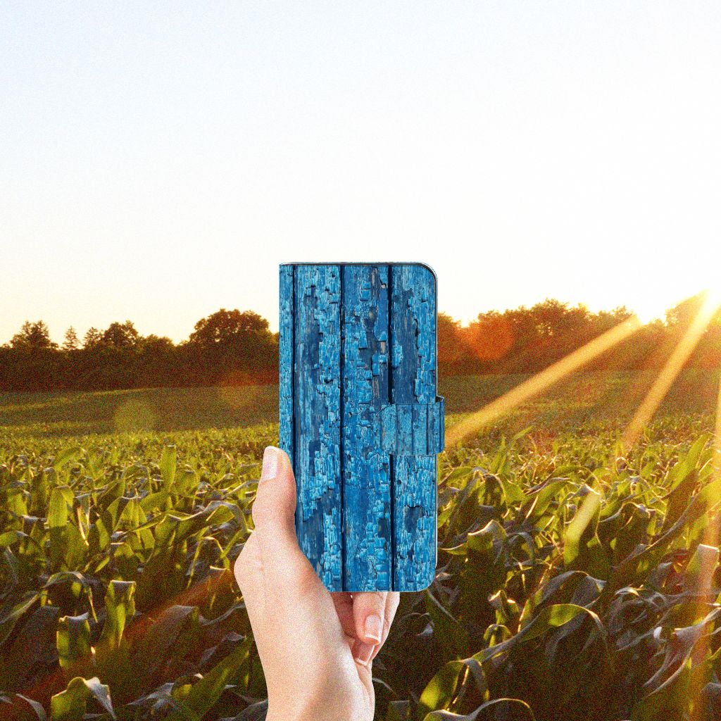 OPPO Reno8 T 4G Book Style Case Wood Blue hand blauw hout voorkant bij zonsondergang
