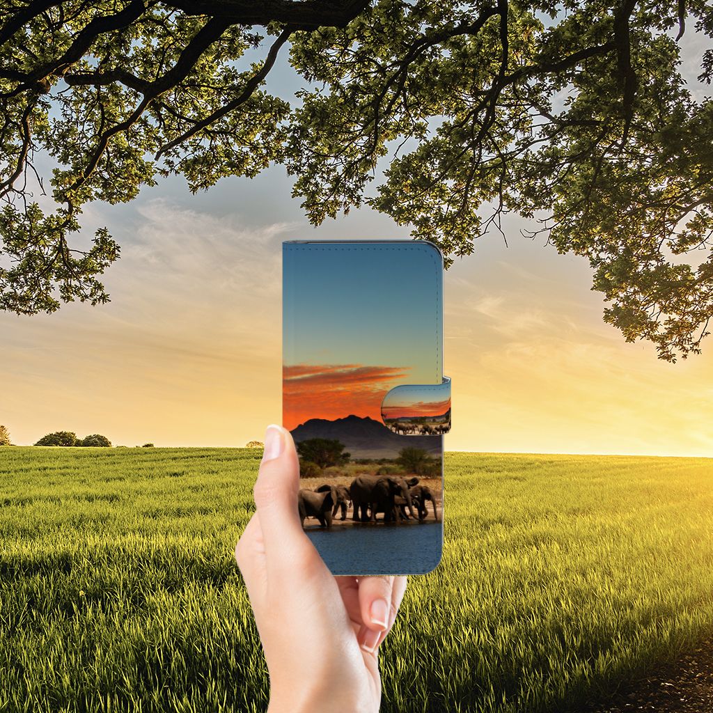 Samsung Galaxy M14 Telefoonhoesje met Pasjes Olifanten in hand, prachtig natuurdesign met olifanten en zonsondergang đ
.