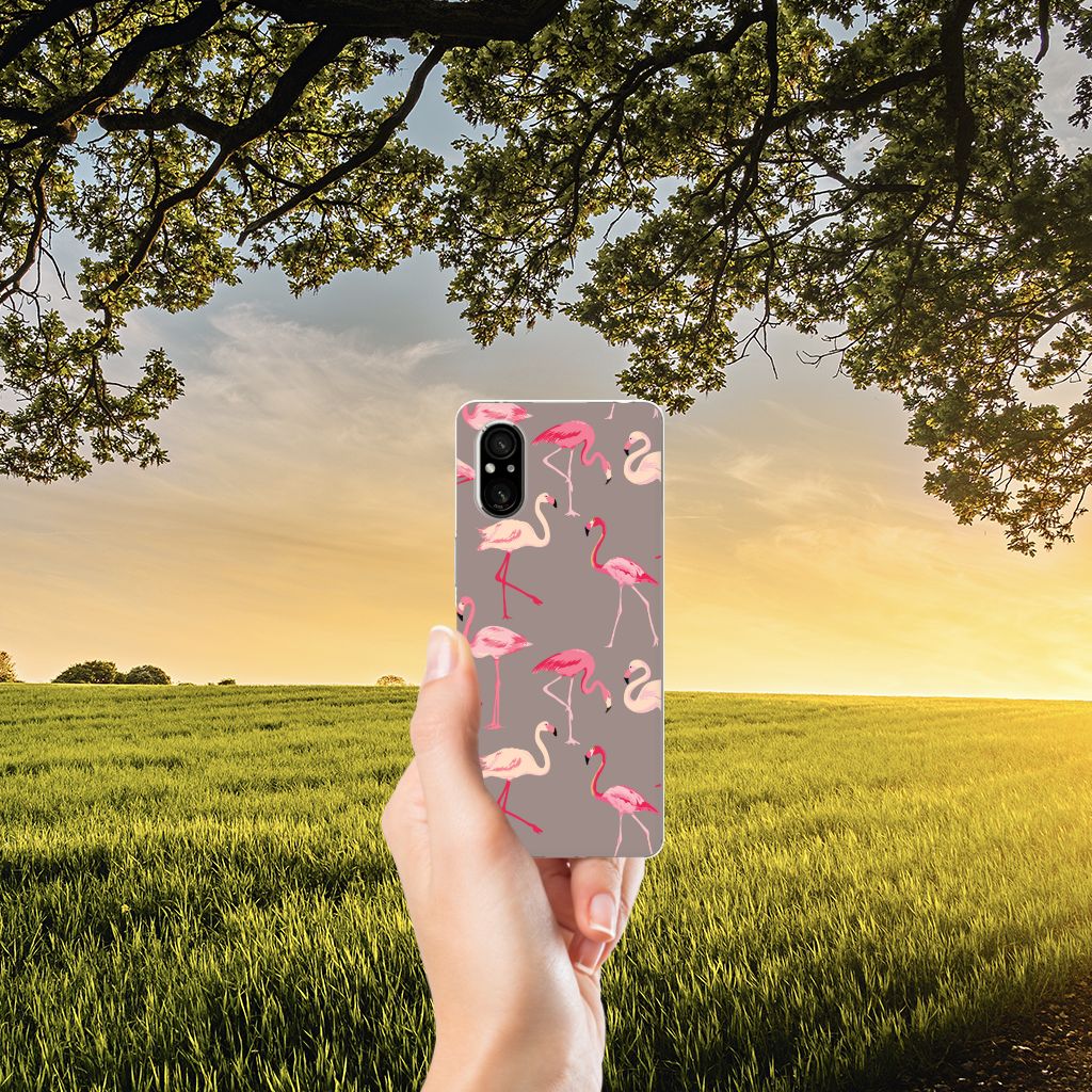 Sony Xperia 5 V TPU Hoesje Flamingo flamingo's achterzijde hand natuur