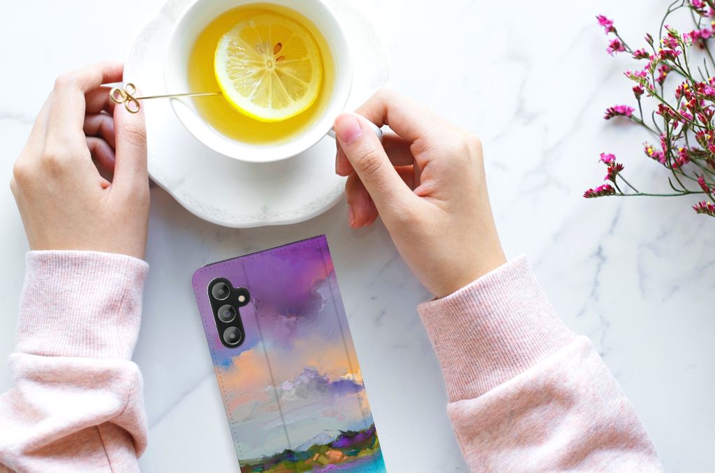 Bookcase Samsung Galaxy A14 5G Boat design on a table with a cup of tea and lemon.