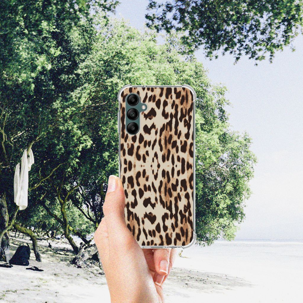 Samsung Galaxy A14 5G/4G Case Anti-shock Leopard held in hand against nature background.