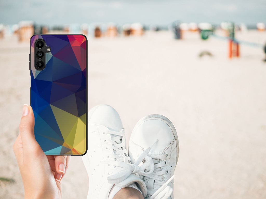 Samsung Galaxy A14 5G Backcover Polygon Dark in hand on beach with sneakers