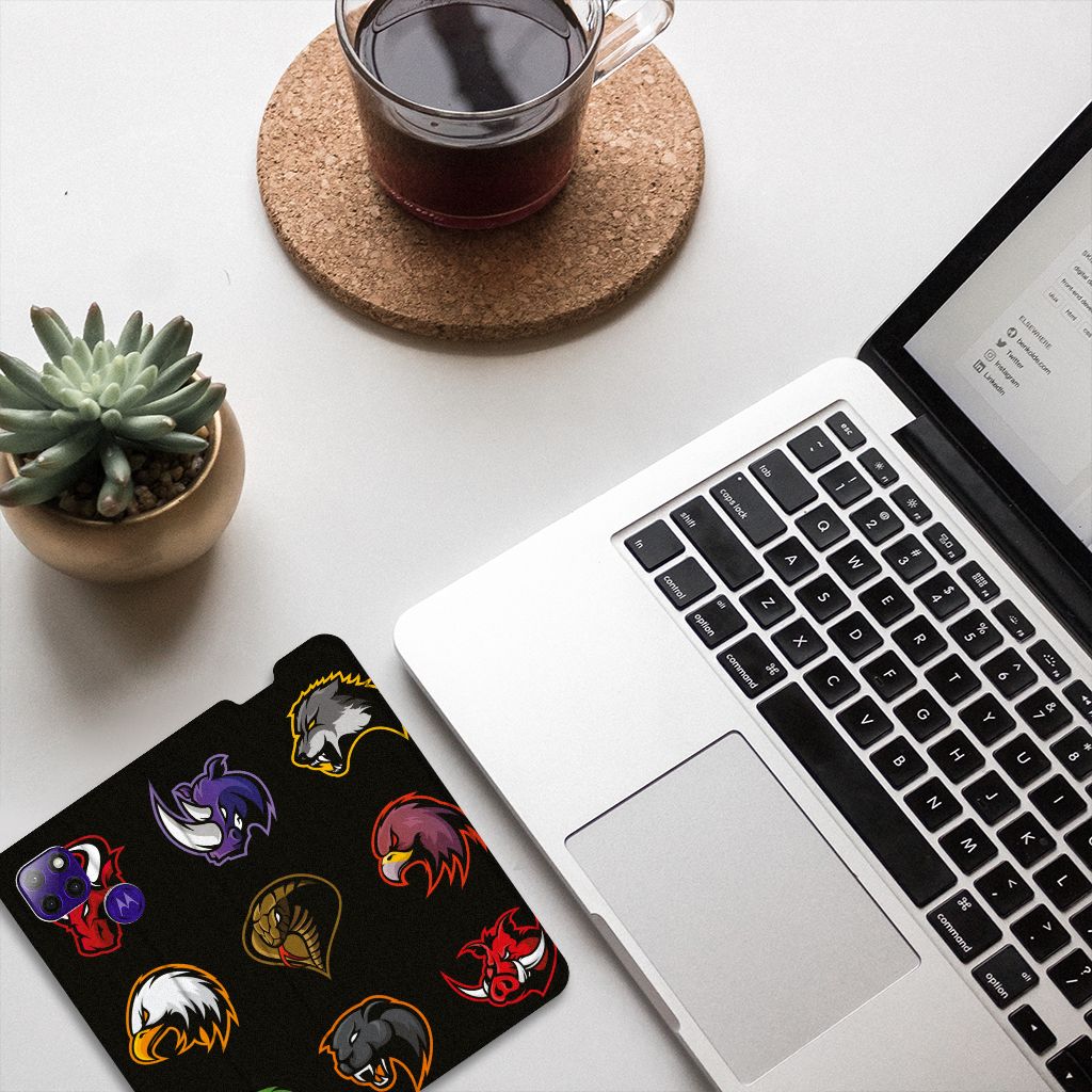 Motorola Moto G9 Power Magnet Case Cartoon on a desk with laptop, coffee, and plant.