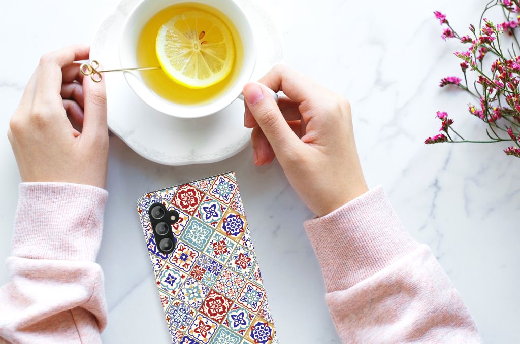 Samsung Galaxy A14 4G Standcase Tiles Color with hands holding a cup of tea and a slice of lemon.