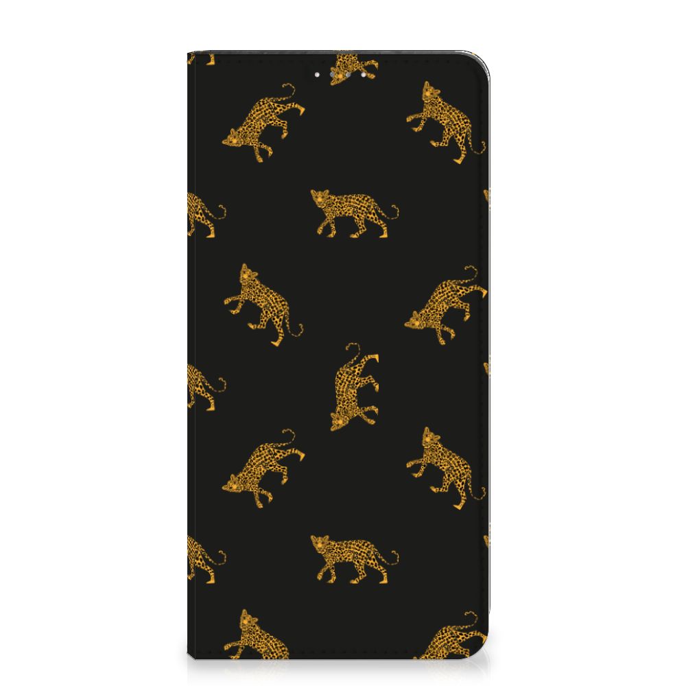 Hoesje maken voor Samsung Galaxy A14 5G Leopards met luipaardenprint op zwarte achtergrond.