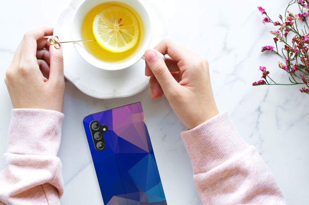 Samsung Galaxy A14 5G Stand Case Polygon Dark design on a table with a cup of tea.
