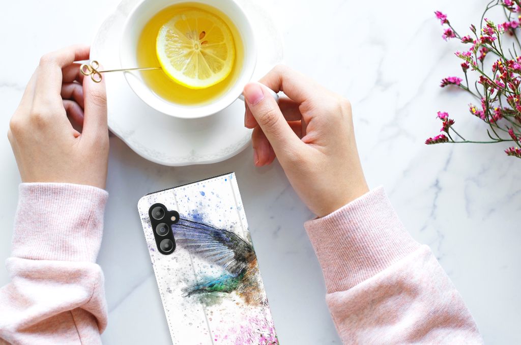 Bookcase Samsung Galaxy A14 4G Vogel met bloemen en een kopje thee op een marmeren tafel