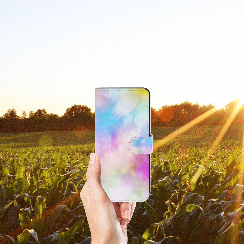 Hoesje Samsung Galaxy M53 Watercolor Light in hand, set against a scenic sunset and cornfield background.