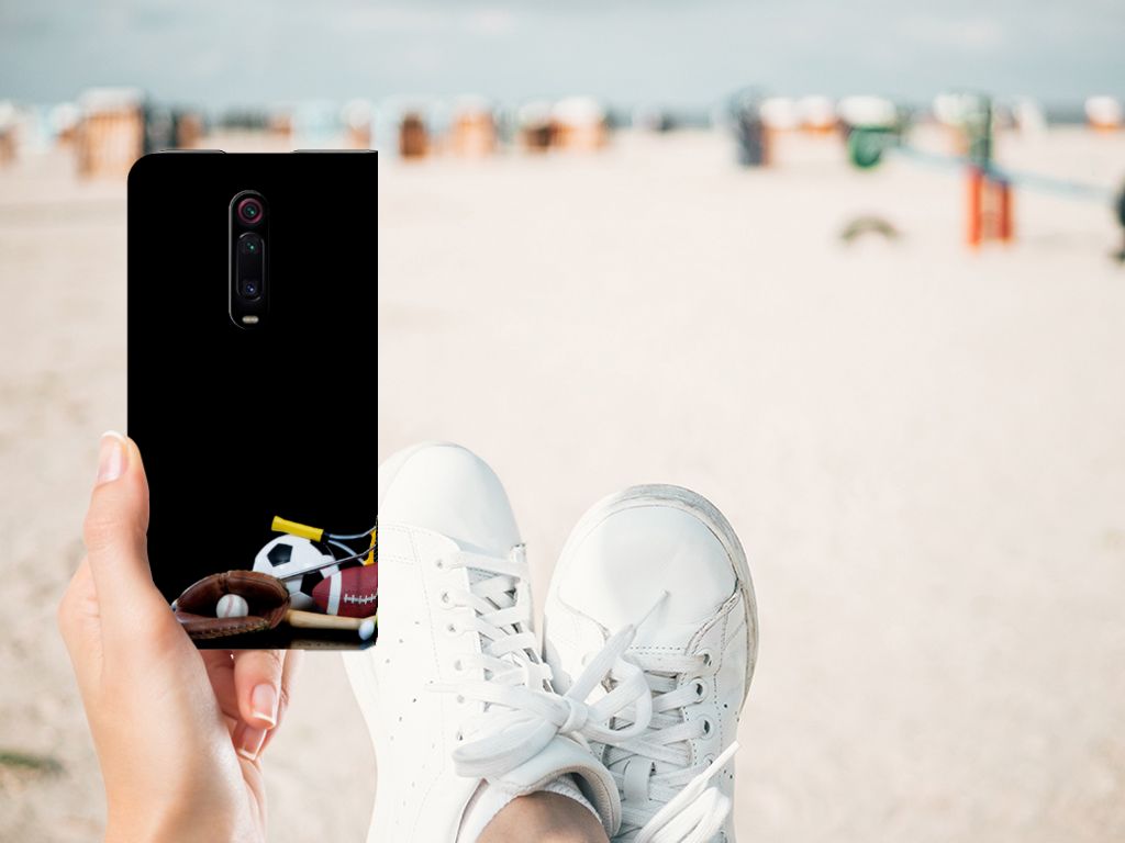 Xiaomi Mi 9T Pro Hippe Standcase Sports featuring sports equipment design on a beach background.