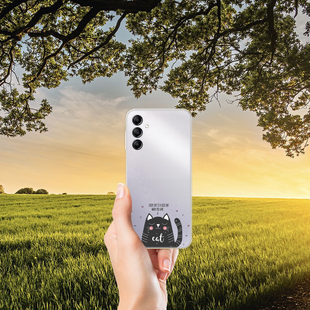 Samsung Galaxy A14 5G Telefoonhoesje met Naam Cat Good Day in hand tegen een natuurlijke achtergrond.
