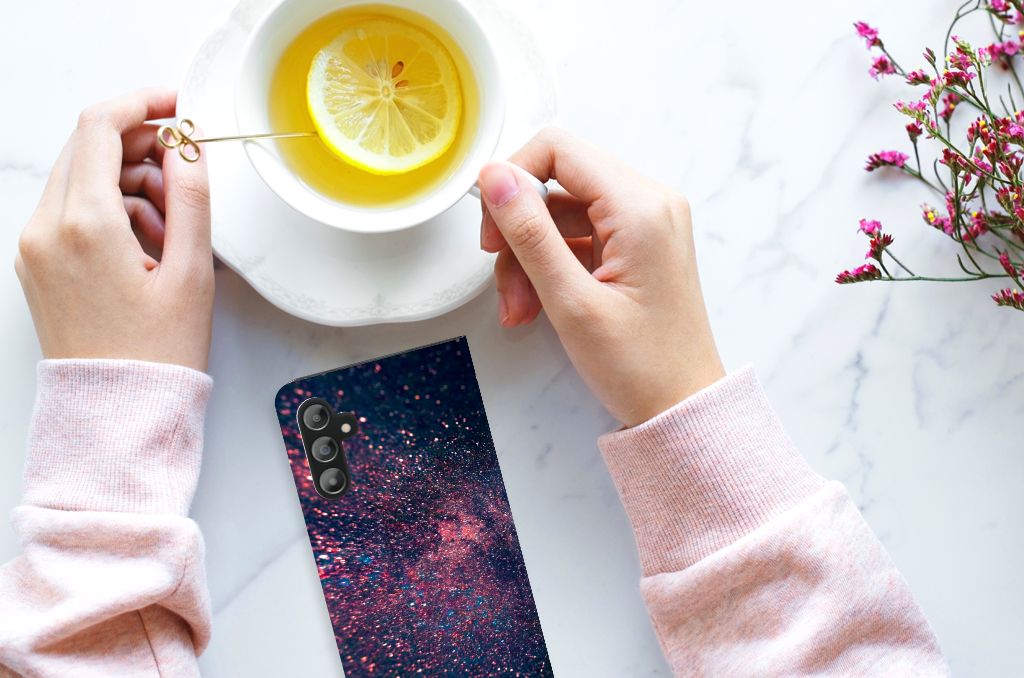 Samsung Galaxy A14 5G Stand Case Stars design with purple and blue colors, held near a cup of tea.