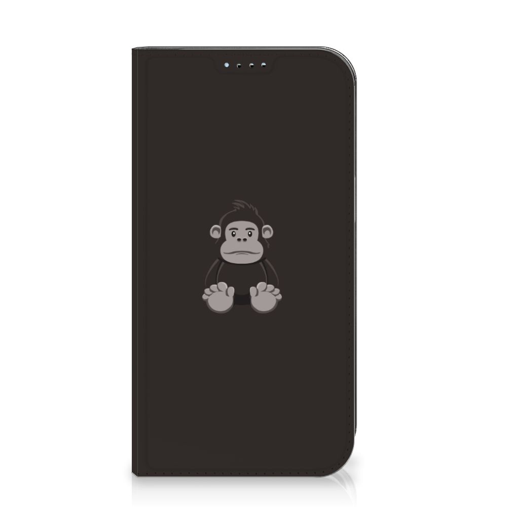 iPhone 15 Magnet Case Gorilla met schattig aapje ontwerp đĻ op een zwarte achtergrond.
