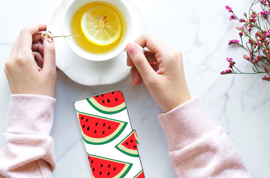 Samsung Galaxy A14 5G Book Cover Watermelons with a cup of tea and lemon on a marble table.