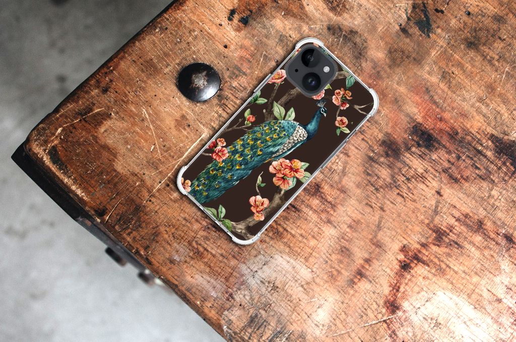 iPhone 15 Case Anti-shock Pauw met Bloemen on a wooden table background