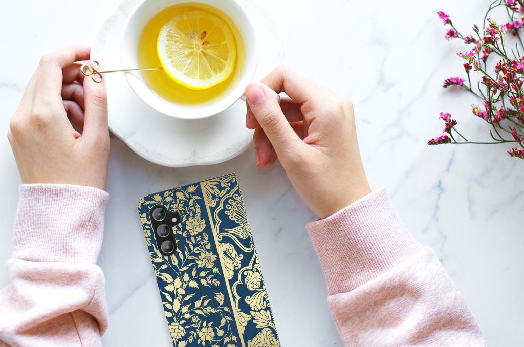 Samsung Galaxy A14 4G Smart Cover Beige Flowers on a marble table with a tea cup and lemon.