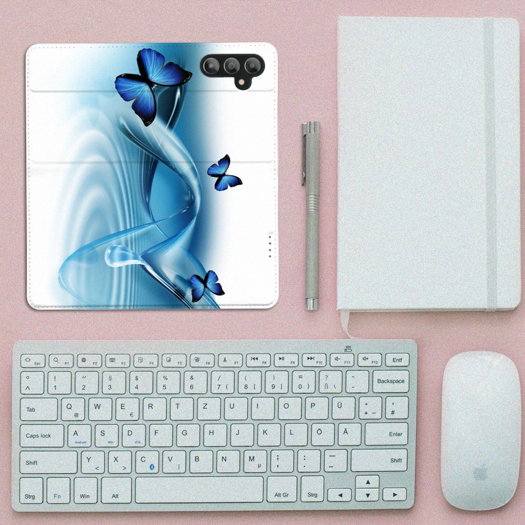 Samsung Galaxy A14 4G Hoesje maken Vlinders met blauwe vlinders op een strakke achtergrond.