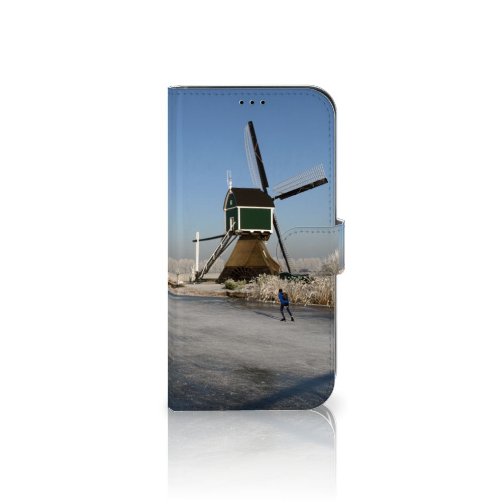 iPhone 13 Pro Max Flip Cover Schaatsers met schaatser en traditionele Nederlandse molen in winterlandschap.