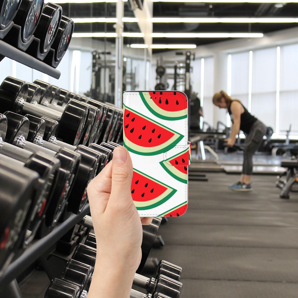 iPhone 13 Pro Book Cover Watermelons in a gym setting with weights in the background, featuring vibrant watermelon design 🍉.
