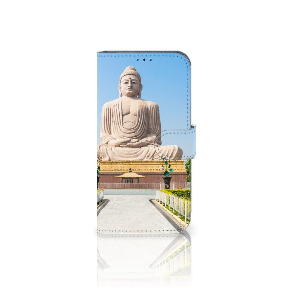 iPhone 14 Pro Flip Cover Boeddha met afbeelding van een grote Boeddha in een tempelomgeving.