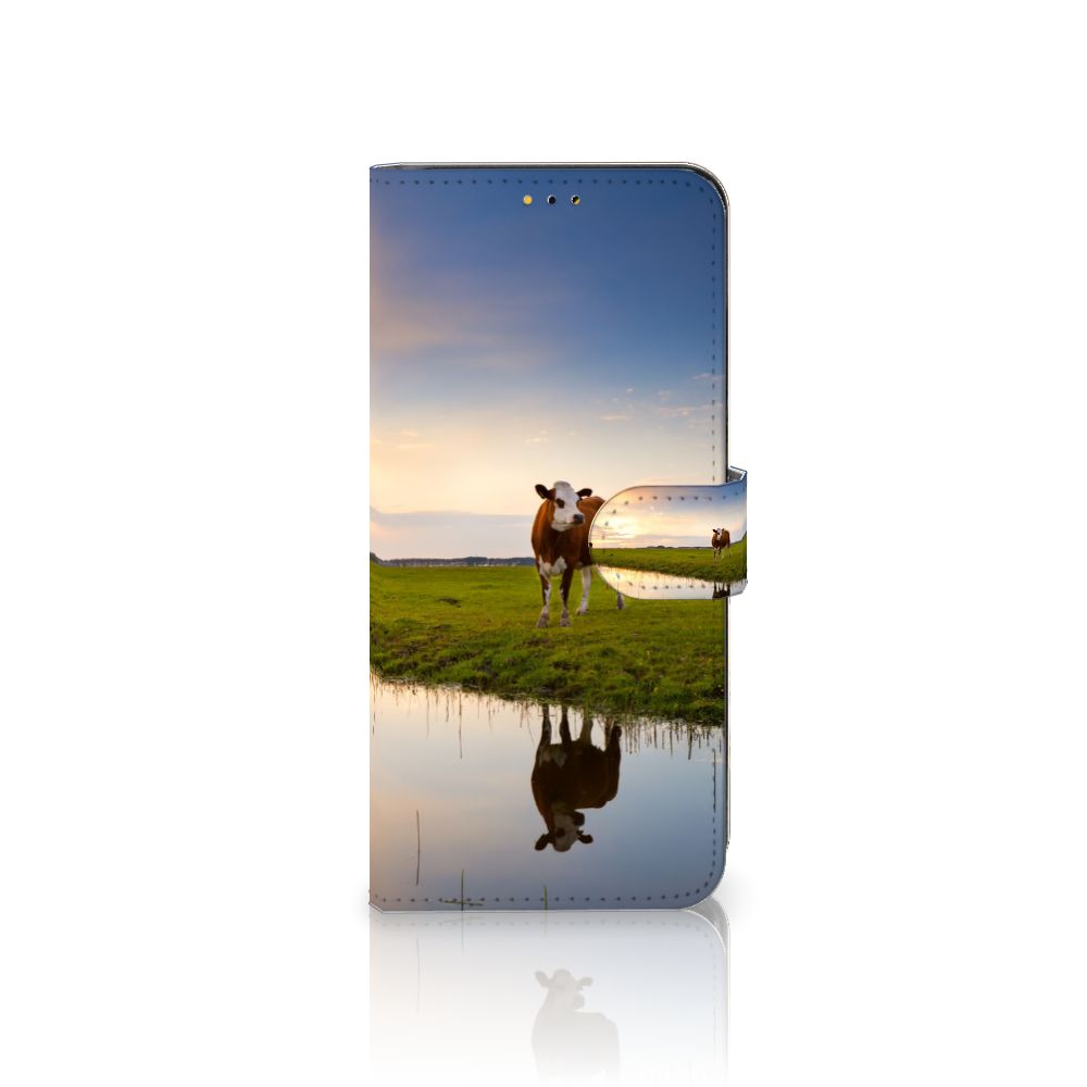 Samsung Galaxy A14 5G Telefoonhoesje met Pasjes Koe met afbeelding van een koe in een weiland.