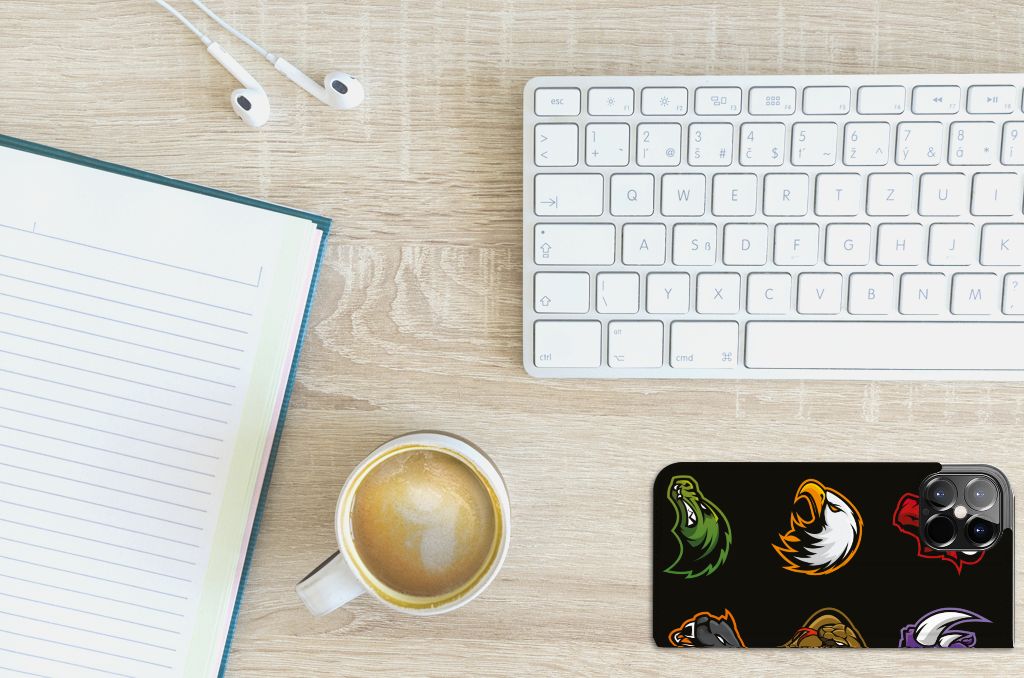 iPhone 12 Pro Max Magnet Case Cartoon with colorful cartoon designs on a desk with coffee and keyboard