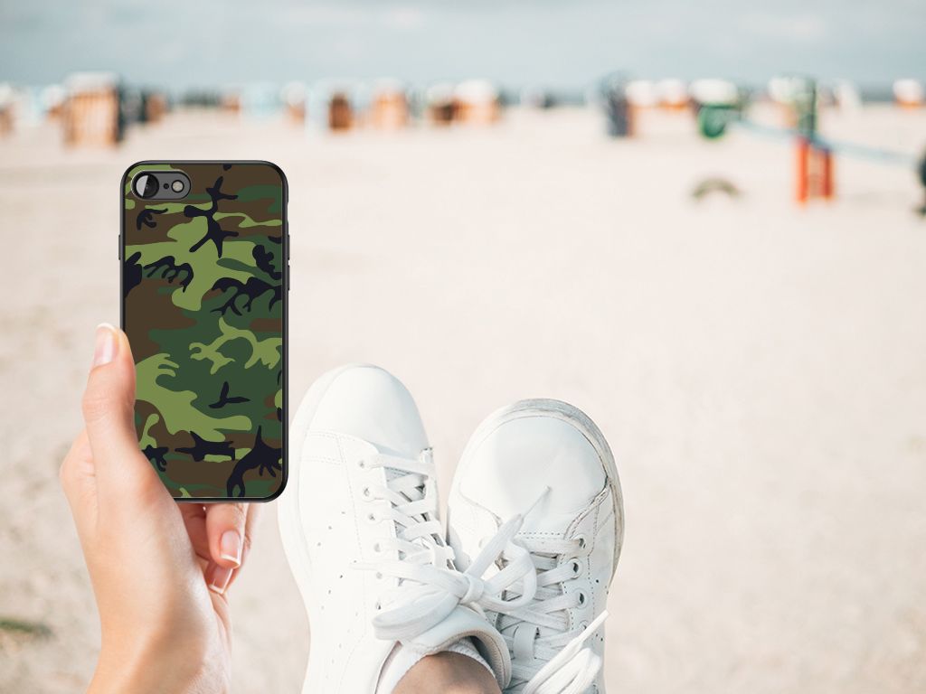 iPhone SE 2022 | SE 2020 | 7/8 Back Case Army Dark displayed on a beach with white sneakers in foreground.