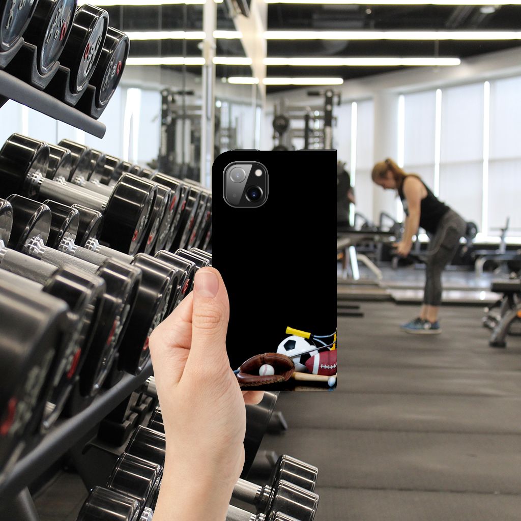 Apple iPhone 14 Plus Hippe Standcase Sports design displayed in a gym setting with weights.