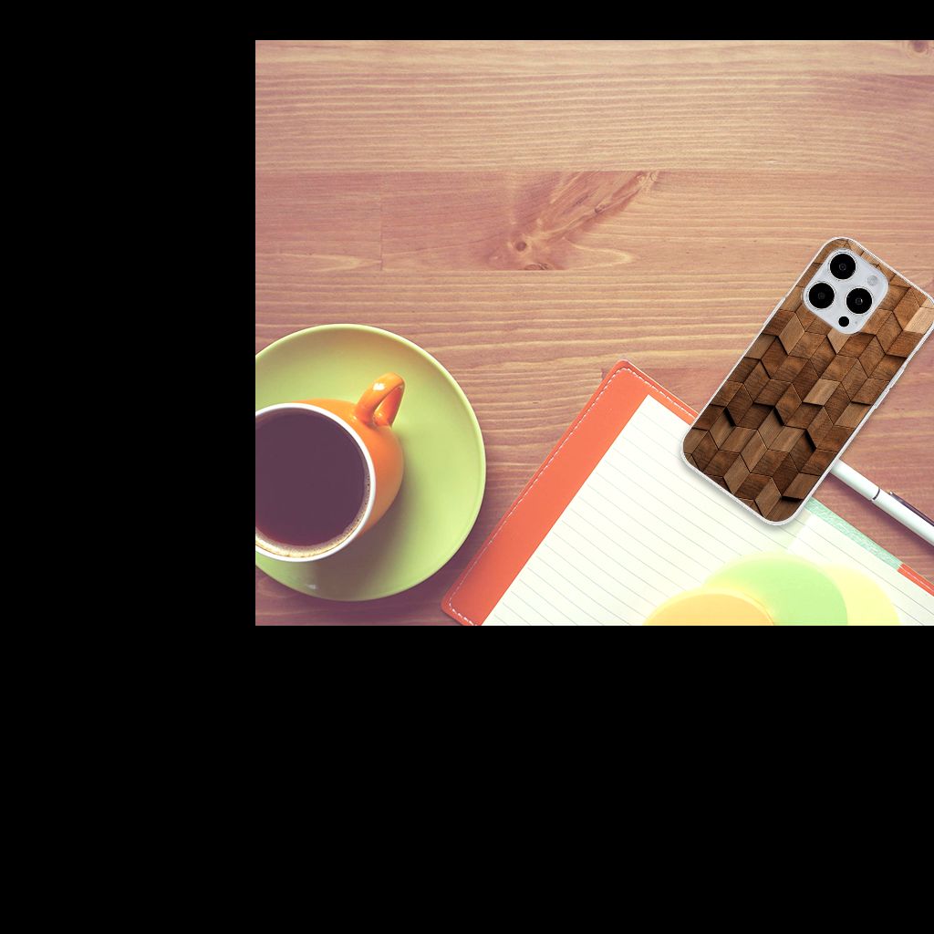 Bumper Hoesje voor iPhone 15 Pro Wooden Cubes op een bureau met een notitieboek en een kop koffie.
