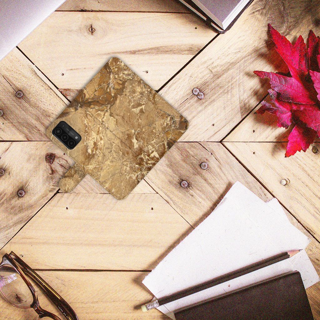 OPPO A54 5G | A74 5G | A93 5G Bookcase Marmer Creme op een houten tafel met papieren en een bril.