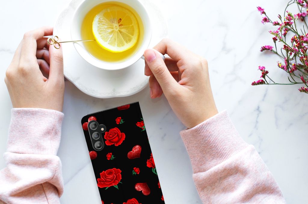 Samsung Galaxy A14 4G Magnet Case Valentine design with roses on a phone beside a cup of lemon tea.