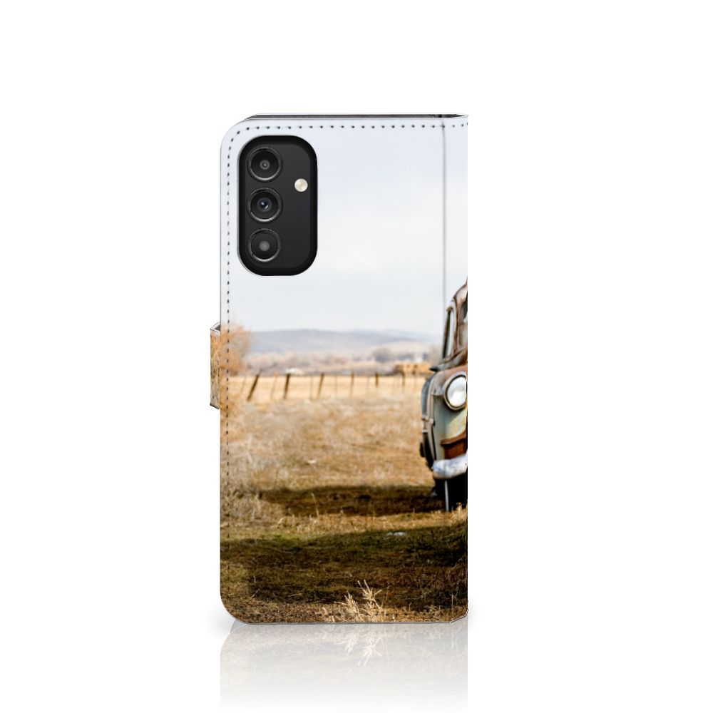 Samsung Galaxy A14 4G Telefoonhoesje met foto Vintage Auto met een vintage auto op de achtergrond.