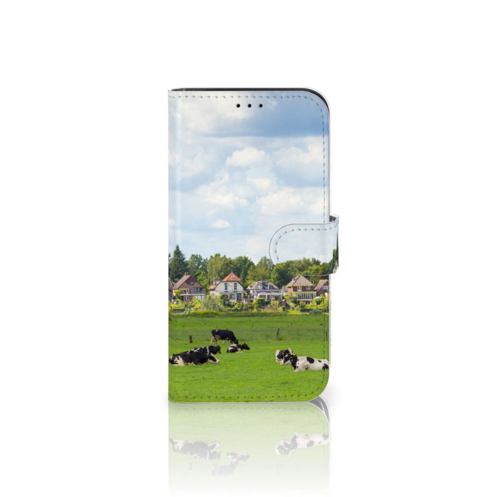 iPhone 13 Pro Telefoonhoesje met Pasjes Koeien met grazende koeien en een groene achtergrond.