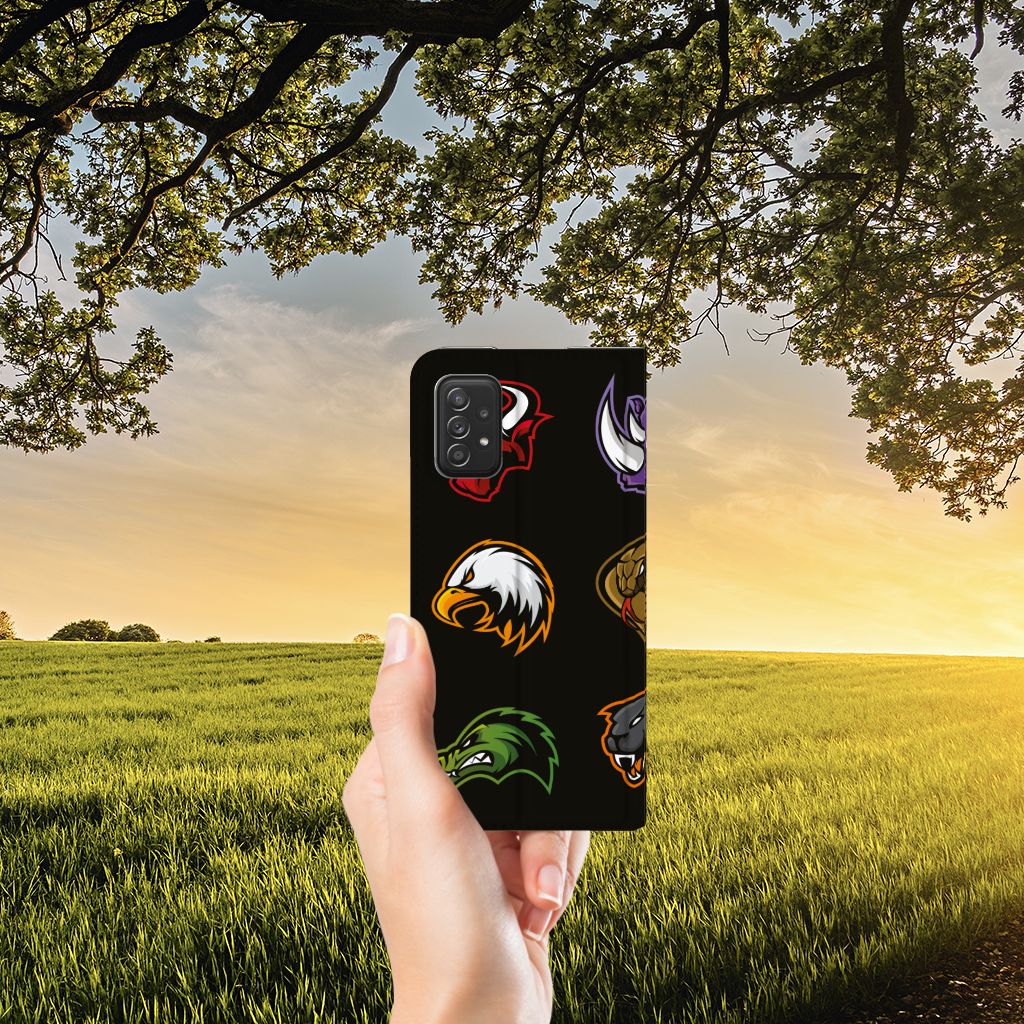 Samsung Galaxy A03s Magnet Case Cartoon with various cartoon designs in hand against a scenic landscape.